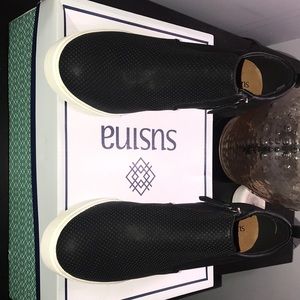 modern faux leather sneaker lifted on hidden wedge heel